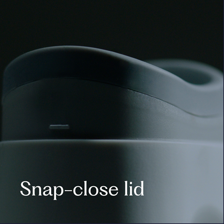 Close-up of the Loona's snap-close lid, showing the curved profile and secure leak-proof seal