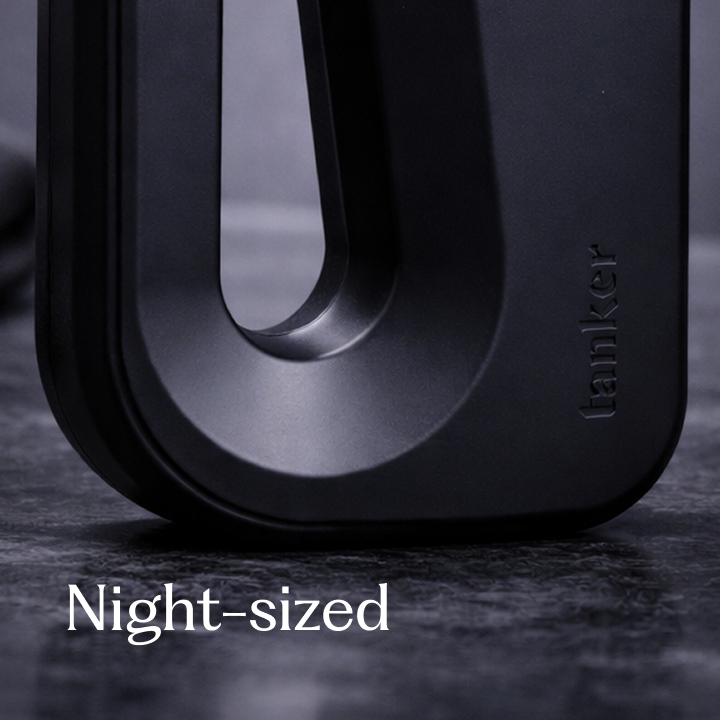 Detailed close-up of the Tanker's easy-hold handle and embossed tanker logo, designed for comfortable nighttime use