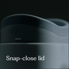 Close-up of the Loona's snap-close lid, showing the curved profile and secure leak-proof seal