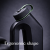 Close-up of black Tanker male urinal highlighting its ergonomic shape and ribbed twist-lock cap with green carry loop