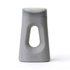 Front view of the Loona female urinal in gray on a white background, featuring the embossed loona logo and ergonomic silhouette